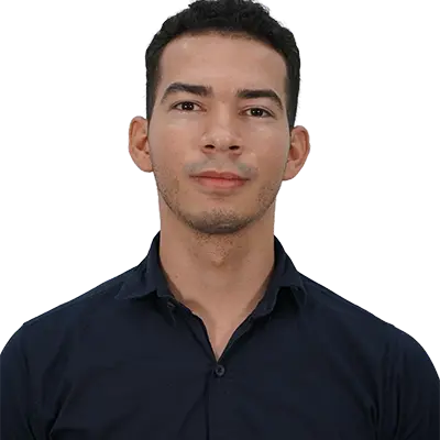 Carlos José Wilches Rojas Asesor de la oficina de relaciones internacionales de internacionalización curricular de la facultad de ciencias de la educación, Hombre joven con camisa azul oscuro mirando directamente a la cámara